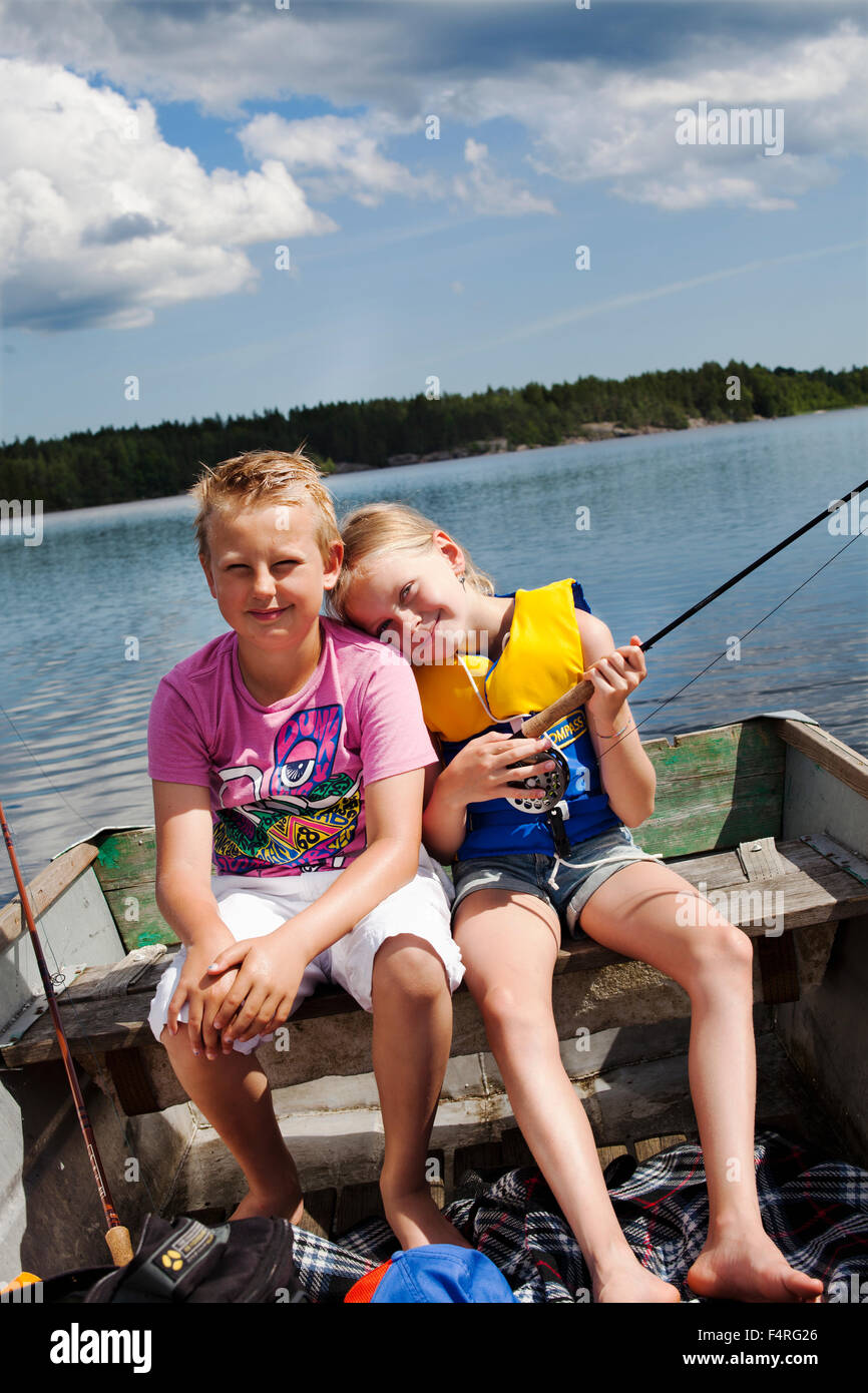 Blonde boy fishing hi-res stock photography and images - Alamy
