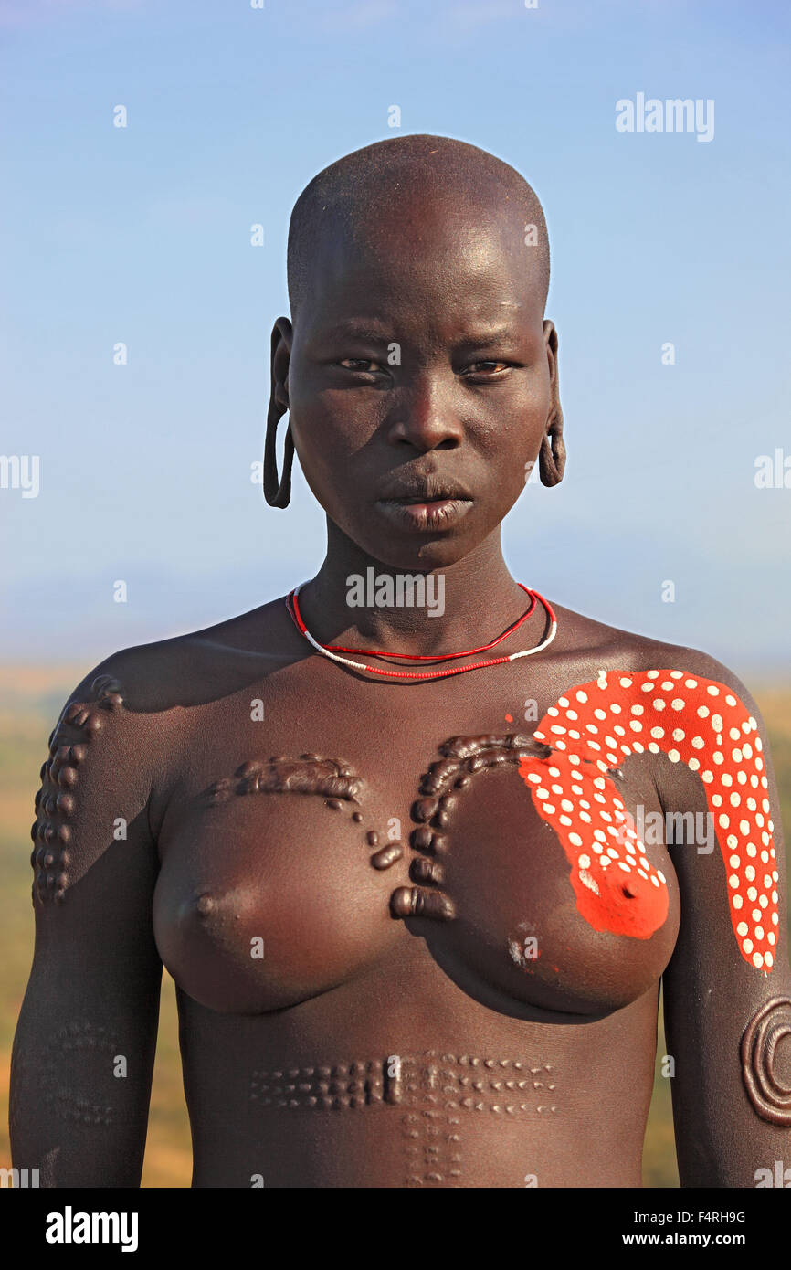 tribe nude in Maco National Park, woman from the tribe of Mursi, Mursi woman my naked  torso and painted skin Stock Photo - Alamy