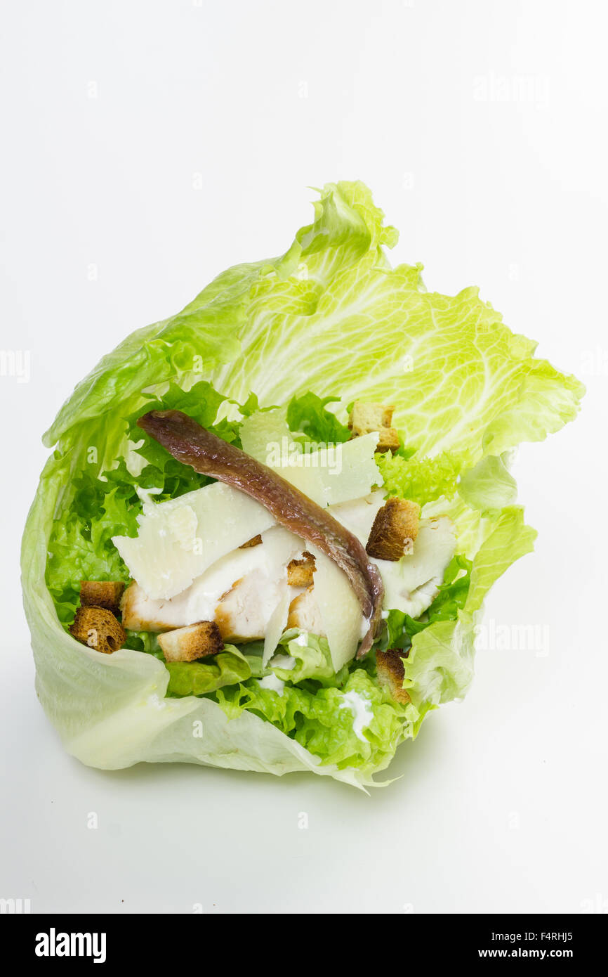 Caesar salad served in a cup made from iceberg lettuce Stock Photo Alamy