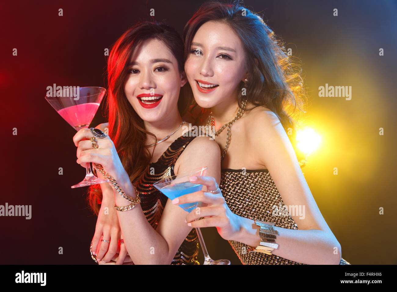 Young women drinking in a bar Stock Photo