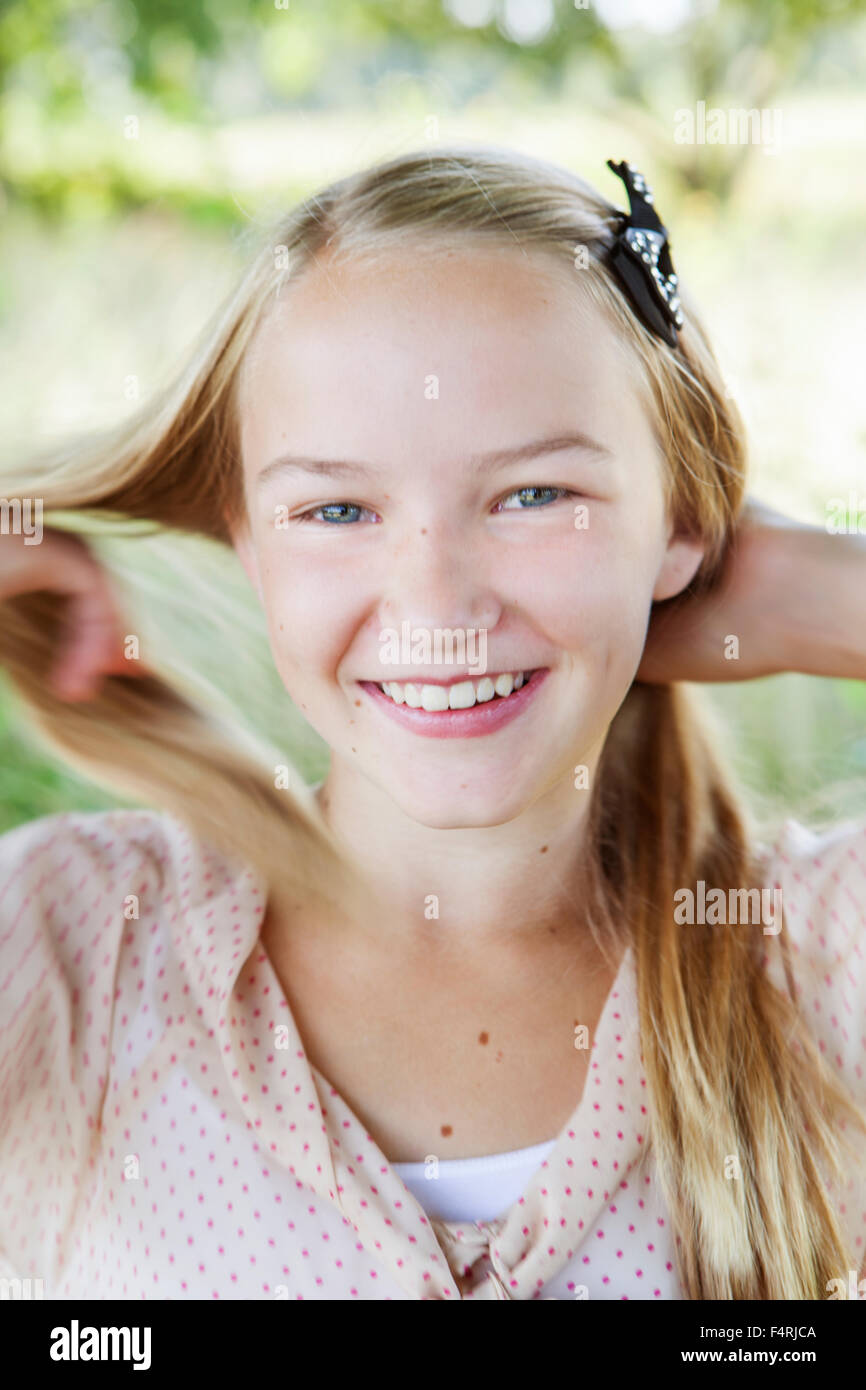 Sweden, Gotland, Eksta, Portrait of smiling girl (12-13 years) Stock Photo