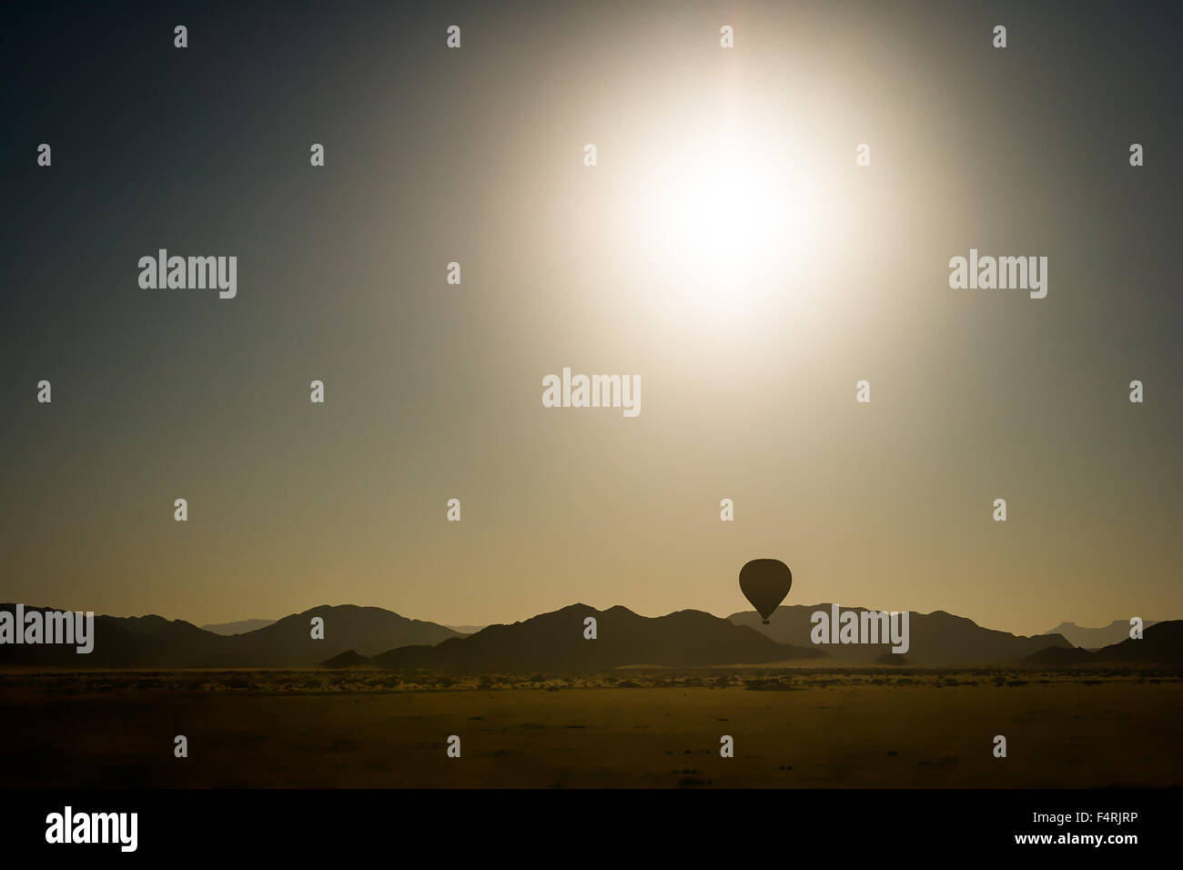 Hot Air Balloon flying over Sesriem Canyon, Namibia. Stock Photo