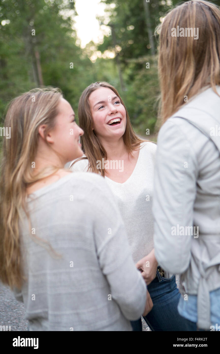 Three girls laughing hi-res stock photography and images - Alamy