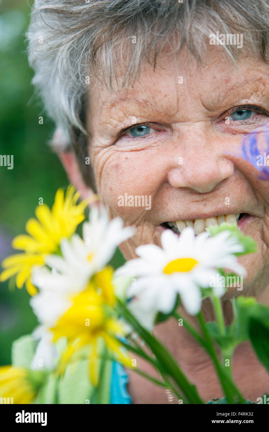 Portrait of senior woman gardening Stock Photo - Alamy