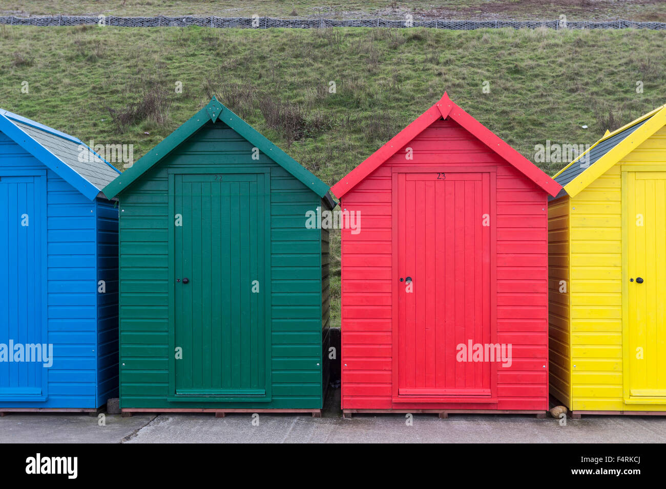 Brightly Coloured Beach Huts Whitby North Yorkshire UK Stock Photo