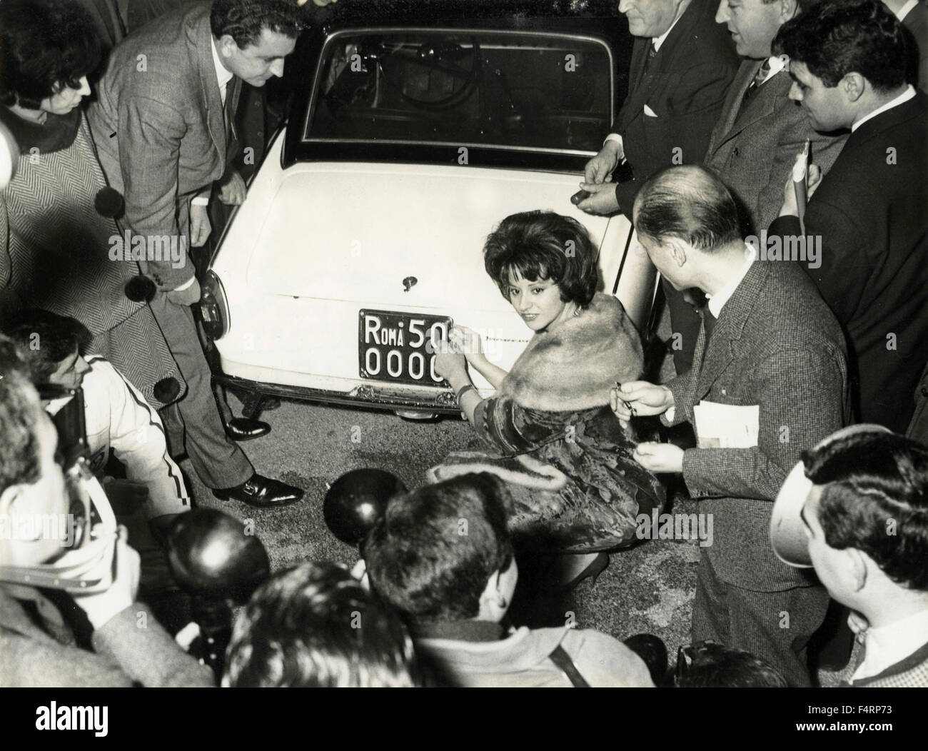 Italian actress Miranda Martino opened the car number plate 500000 Rome, Italy Stock Photo