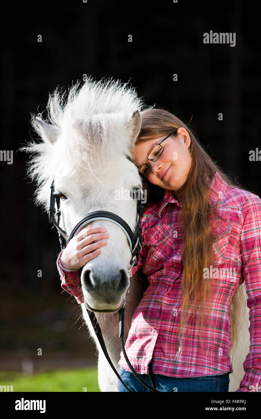 Girl with a pony, Schimmel, Austria Stock Photo