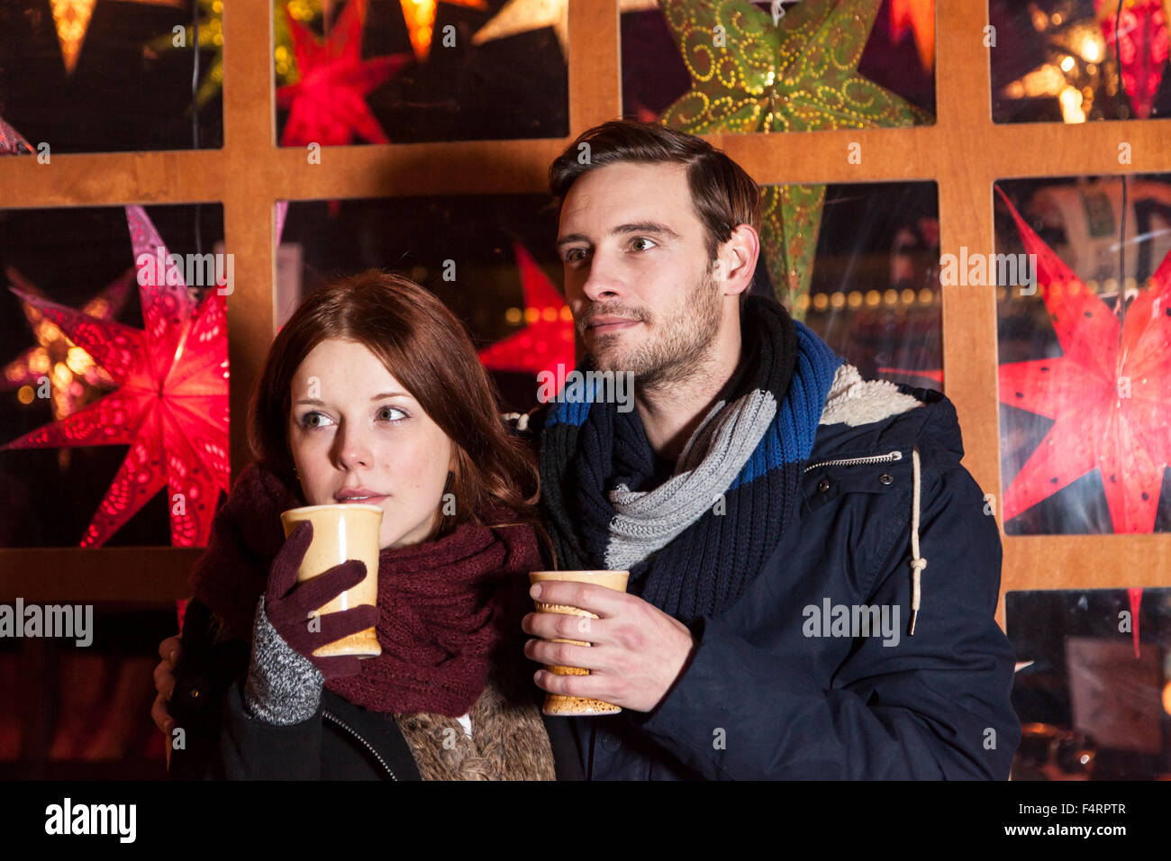 couple peer on christmas market Stock Photo
