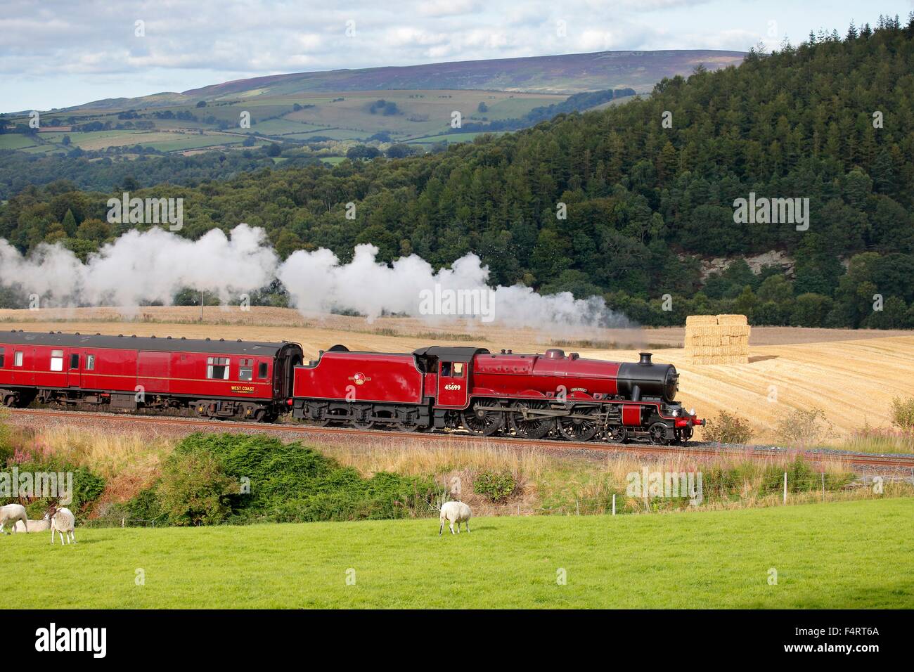 Steam locomotive LMS Jubilee Class 45699 Galatea near Low Baron Wood Farm, Armathwaite ,Eden Valley, Cumbria, England, UK. Stock Photo