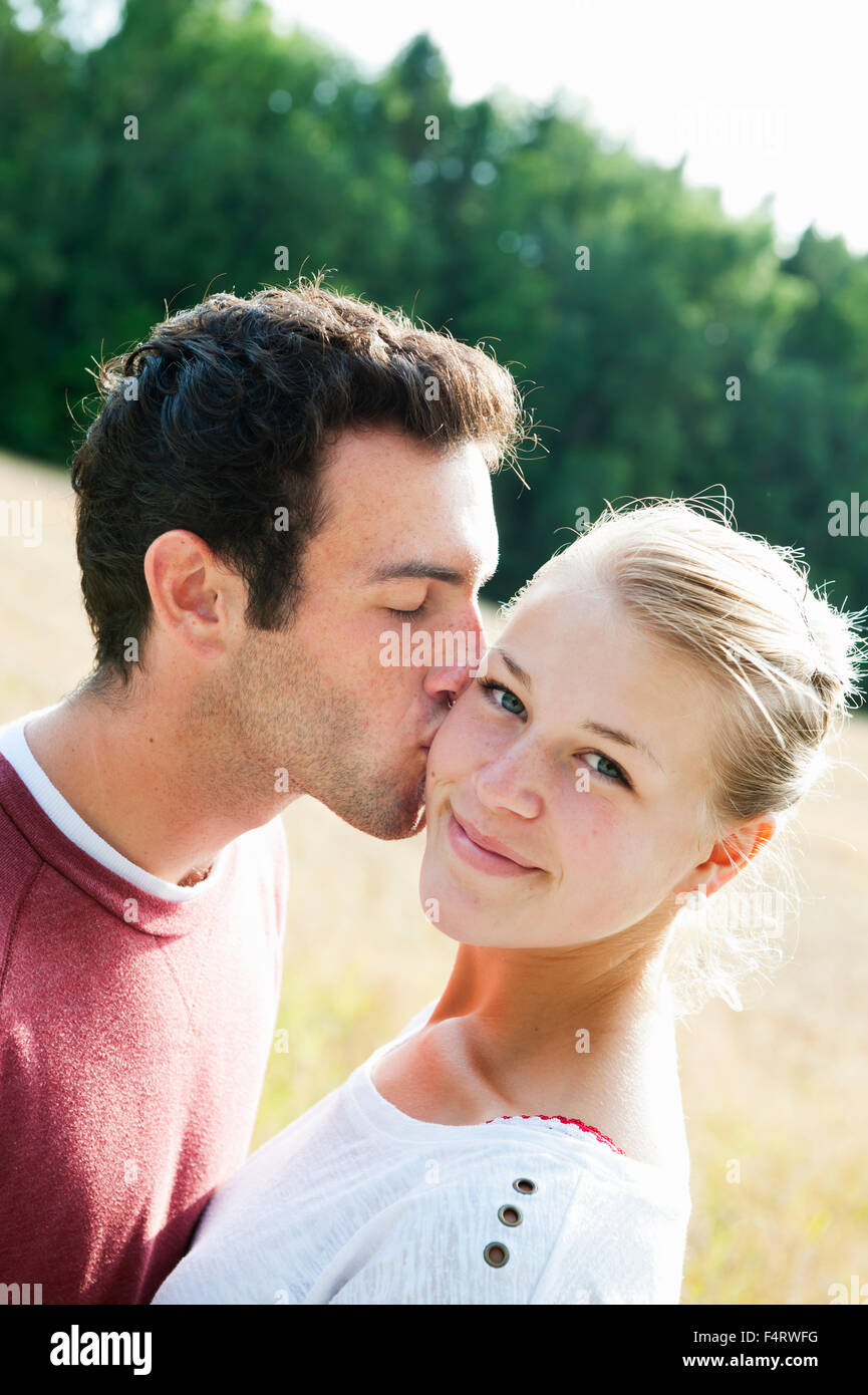 Kissing cheek hi-res stock photography and images - Alamy