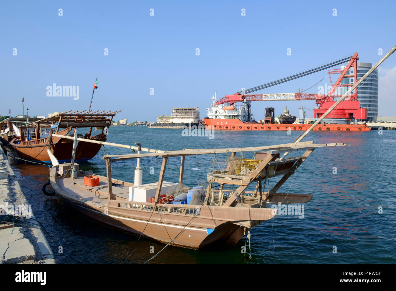 View of traditional and modern ships in port at Ras al Khaimah emirate in United Arab Emirates Stock Photo