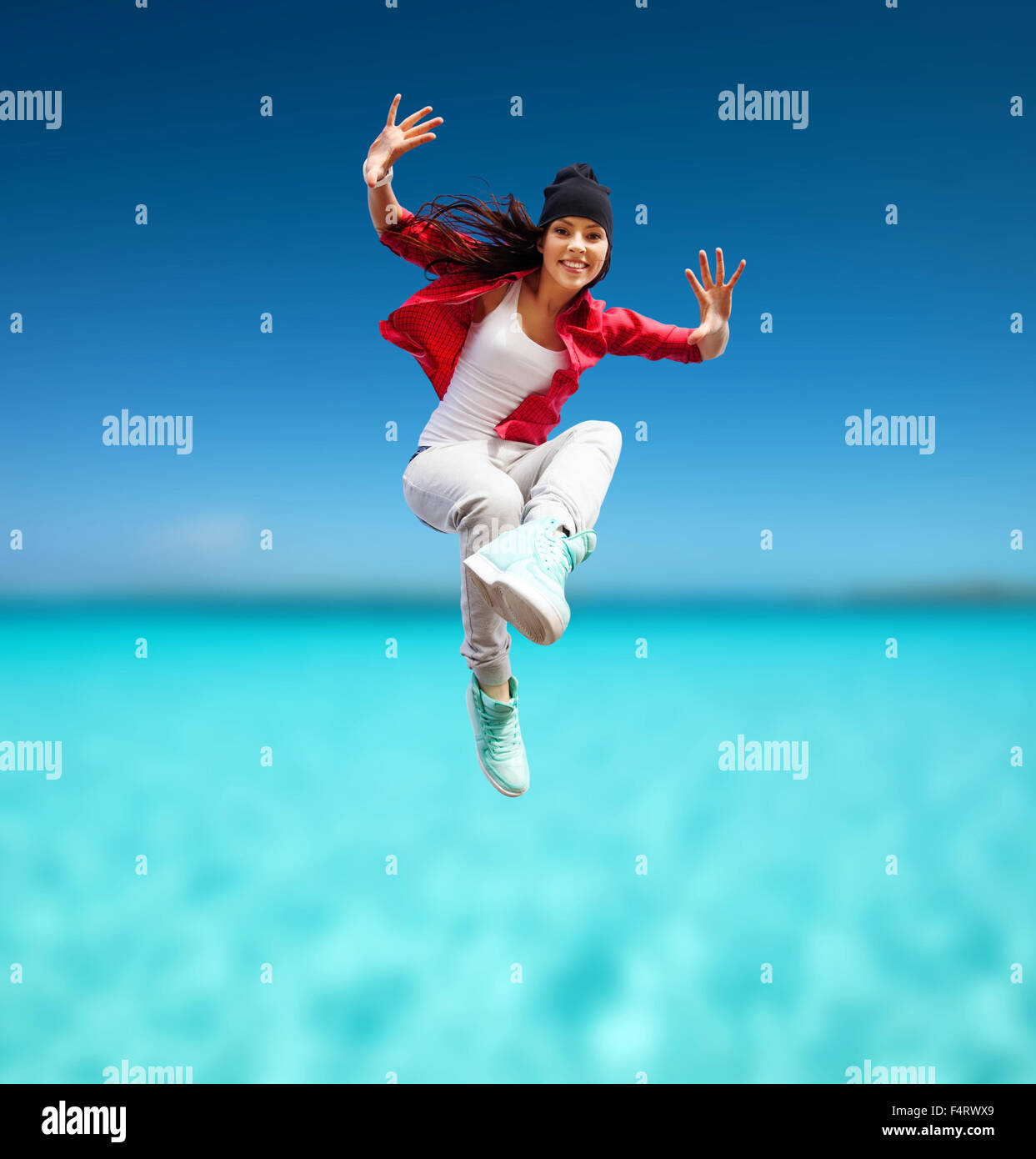 beautiful dancing girl jumping Stock Photo Alamy