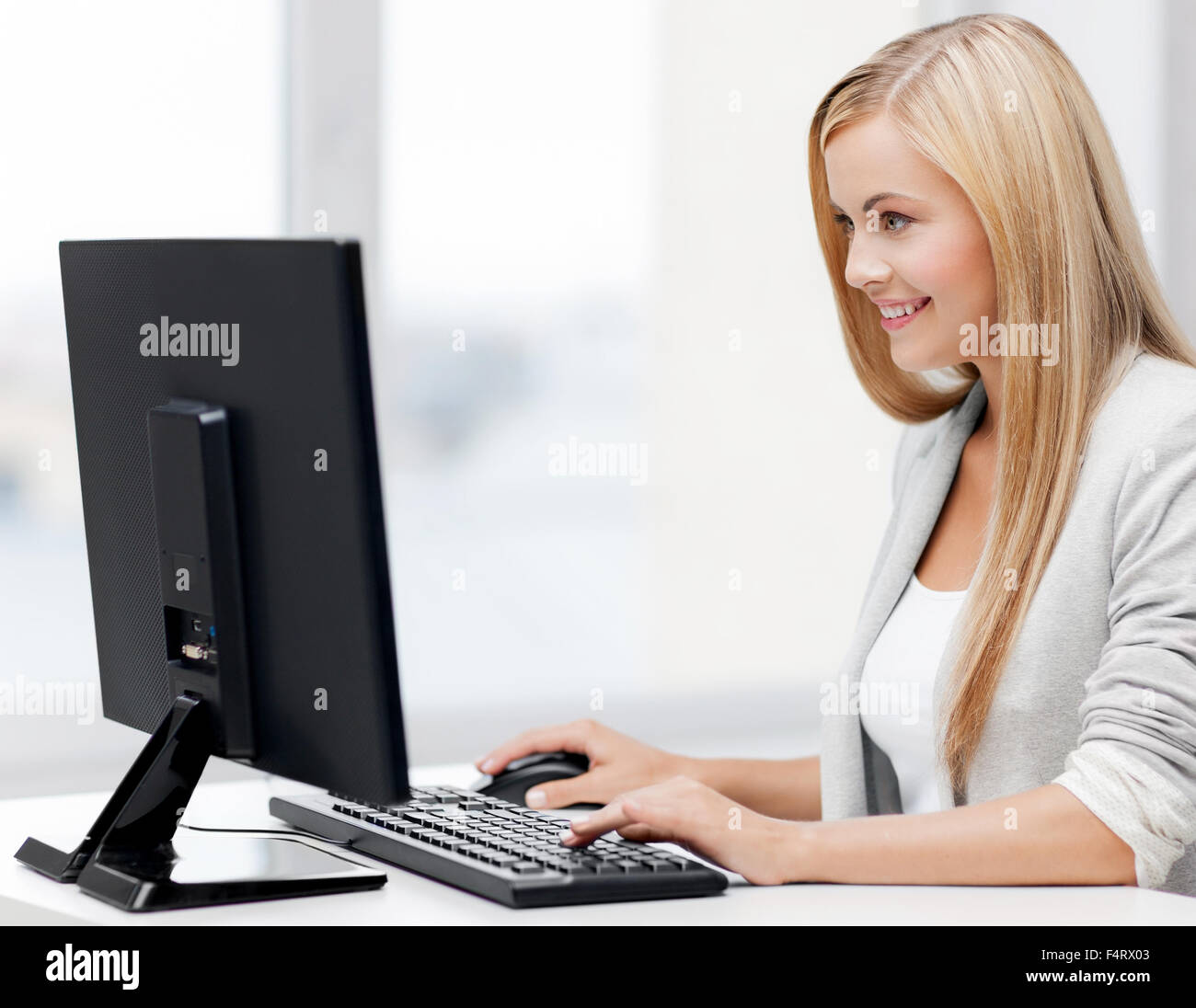 businesswoman with computer Stock Photo