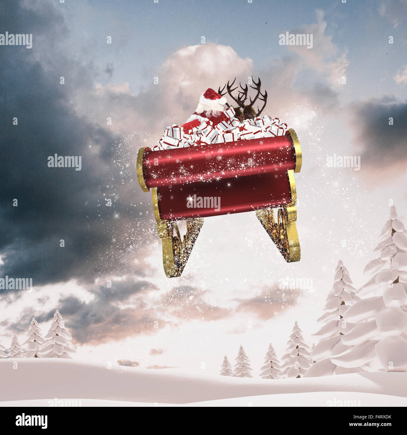Composite image of santa flying his sleigh Stock Photo Alamy