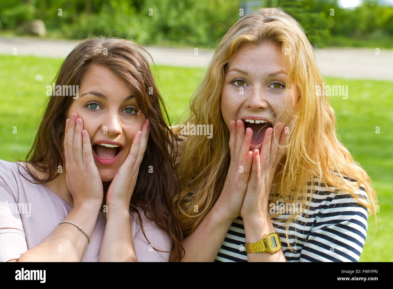 Two surprised girls Stock Photo