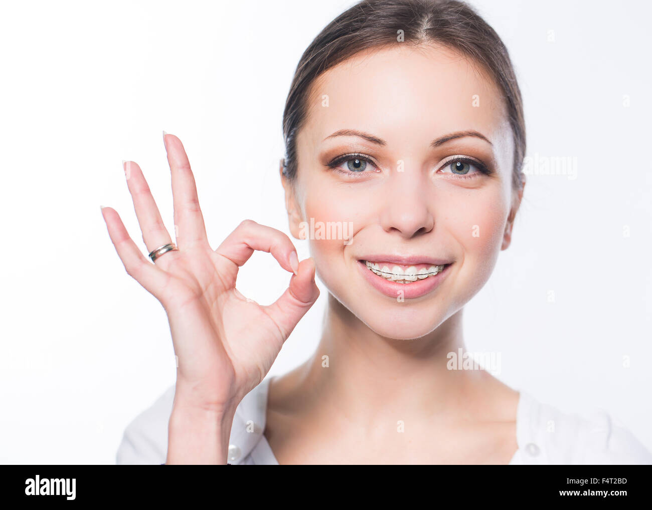 Woman with teeth braces Stock Photo - Alamy
