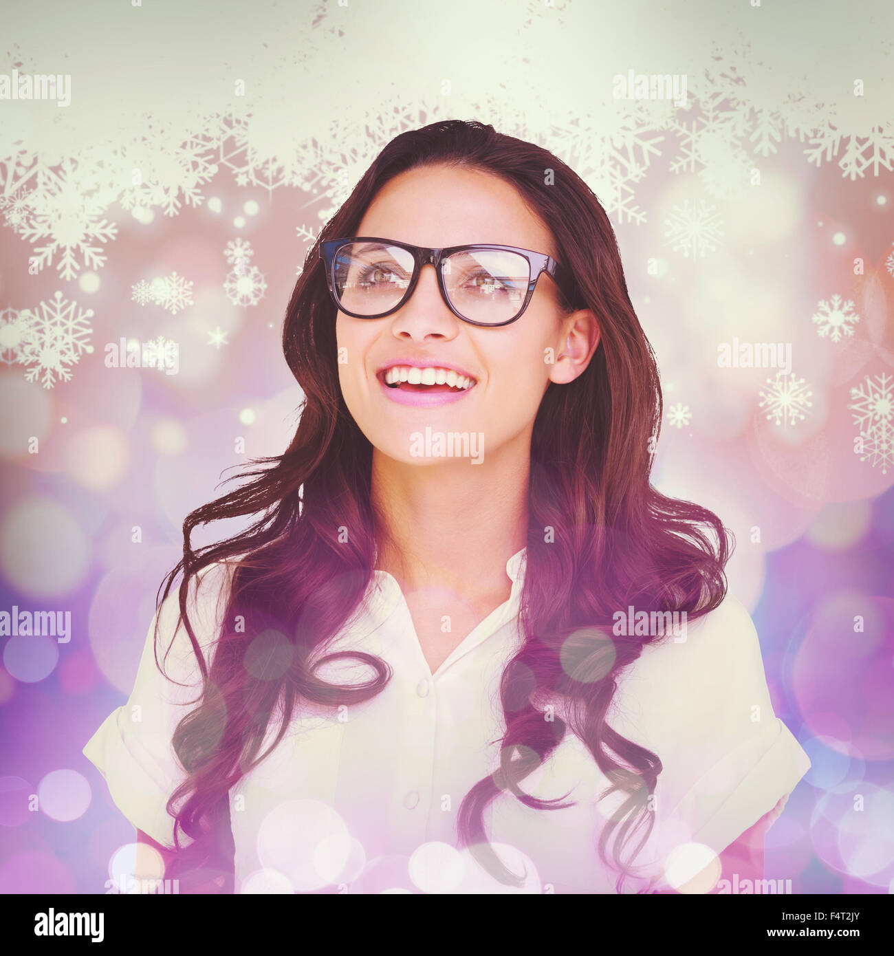 Composite image of pretty brunette in hipster glasses Stock Photo