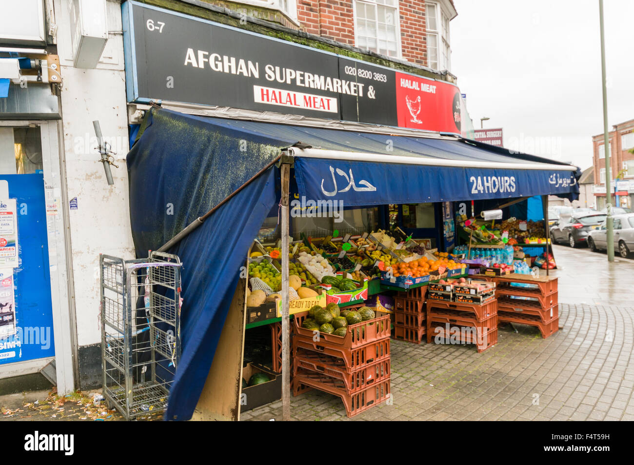 Afghan supermarket in West London, open 24 hours, selling Halal meat Stock Photo