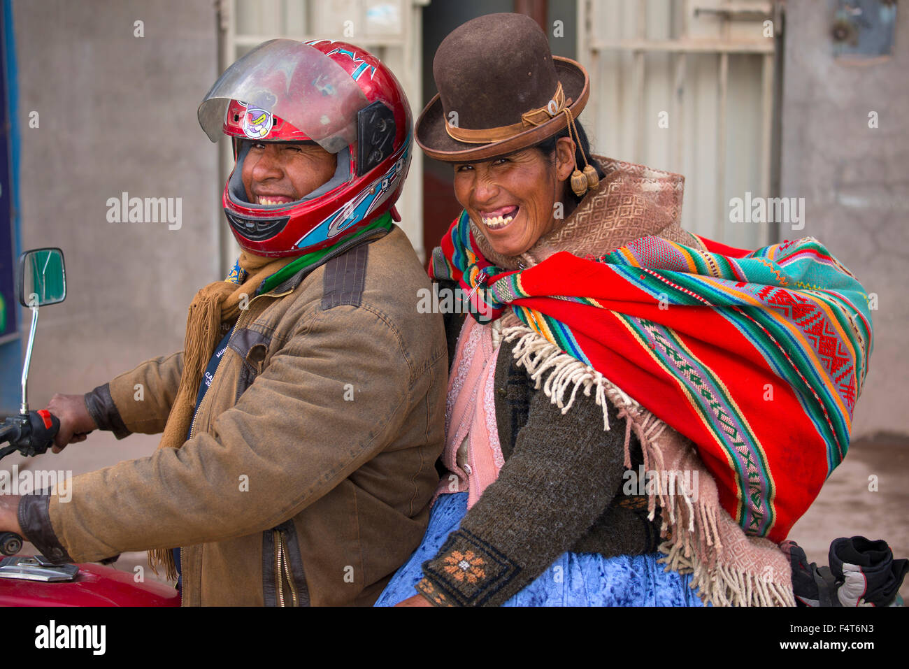 South America, Latin America, Peru, Juliaca, smiling indians on bike Stock Photo