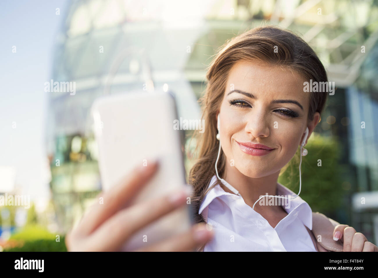 Beautiful young business woman Stock Photo - Alamy