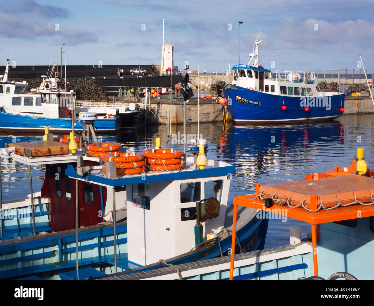 Boats in the harbour at seahouses hi-res stock photography and images ...