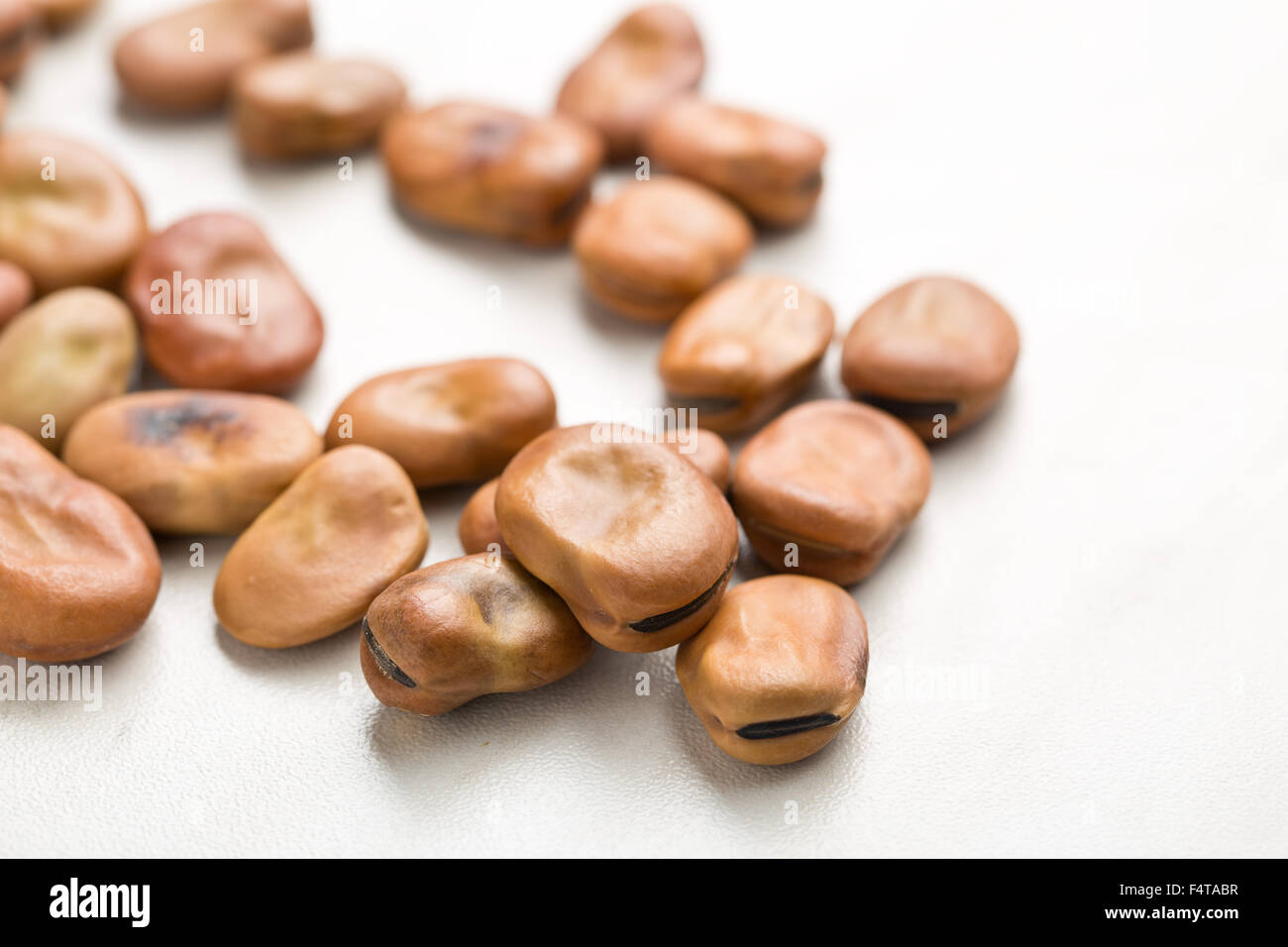 dried broad beans on kitchen table Stock Photo Alamy