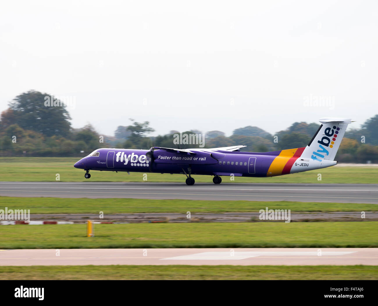 Flybe Airline Bombardier Dash8-Q400 Airliner G-JEDU Taking Off at Manchester Airport England United Kingdom UK Stock Photo