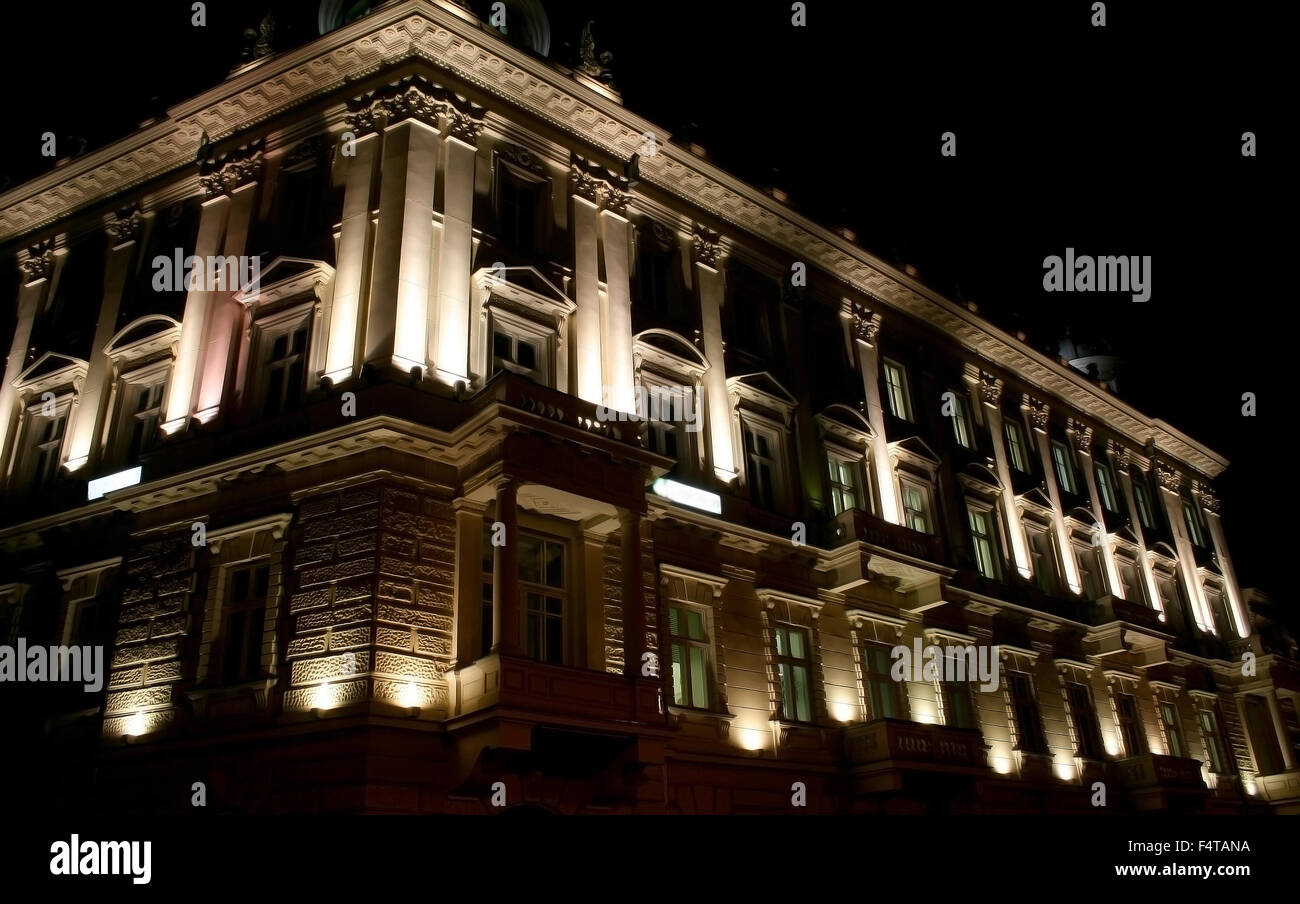 Old tenement house in Warsaw, Poland at night with dramatic illumination Stock Photo