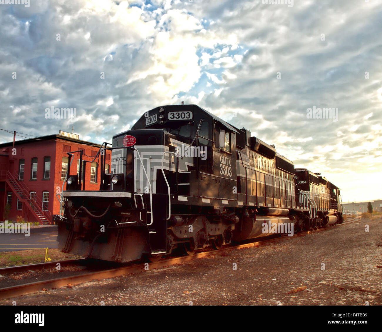 Solvay, New York, USA. October, 22,2015. The Fingerlakes Railway locomotive parked on the railway tracks in front of Chinatown Stock Photo