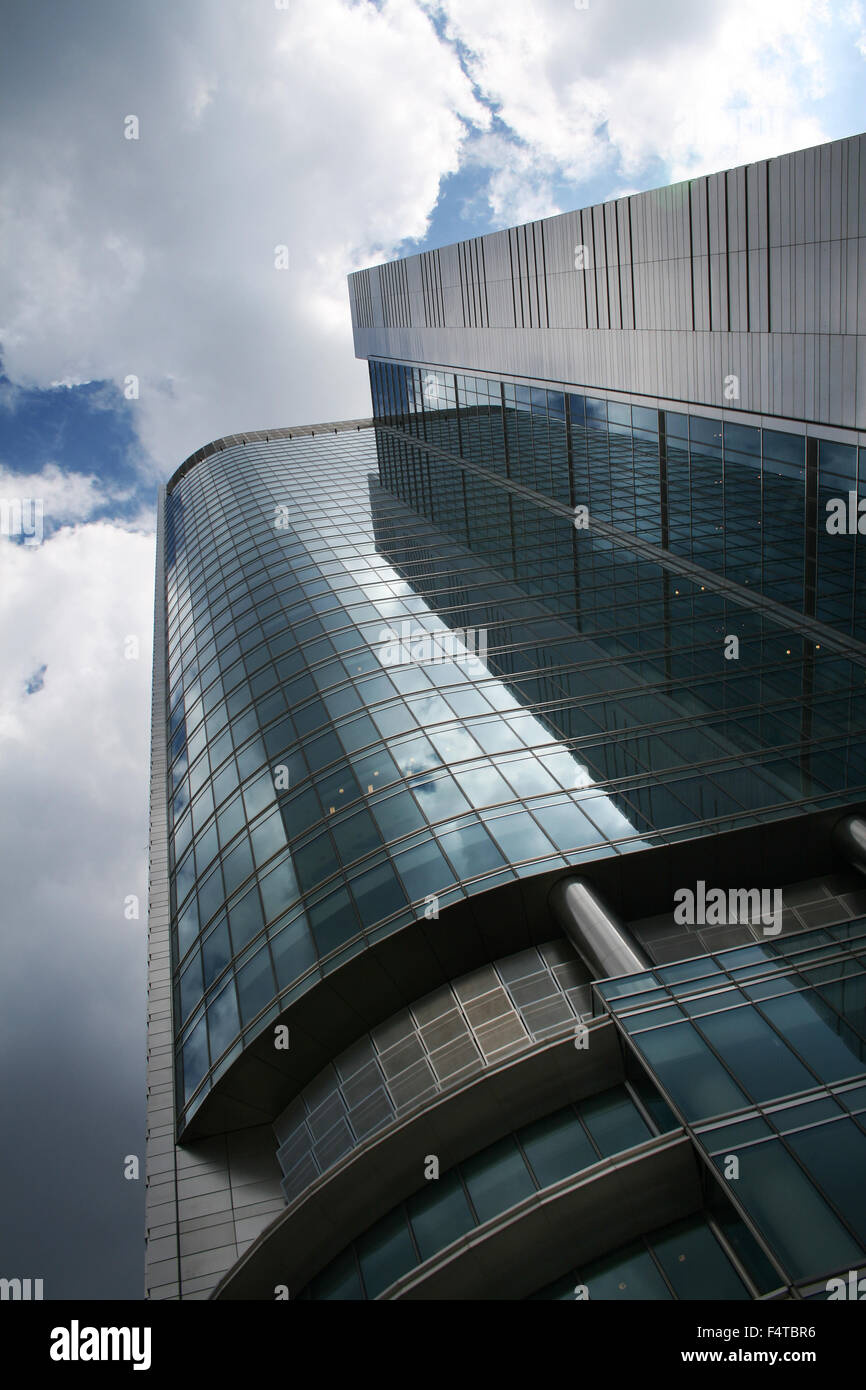 Office building against cloudy sky, Warsaw, Poland Stock Photo - Alamy