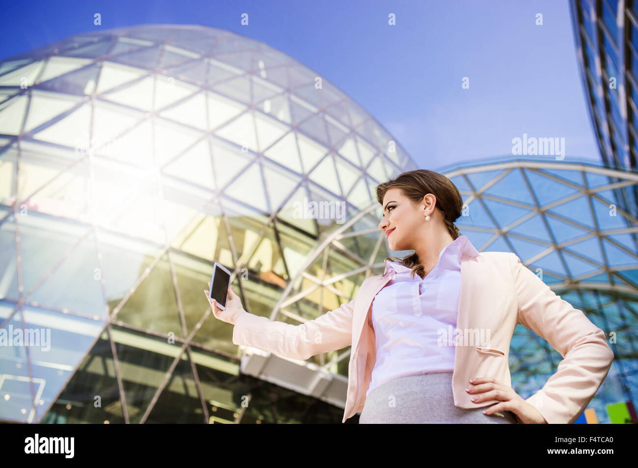 Beautiful young business woman Stock Photo - Alamy