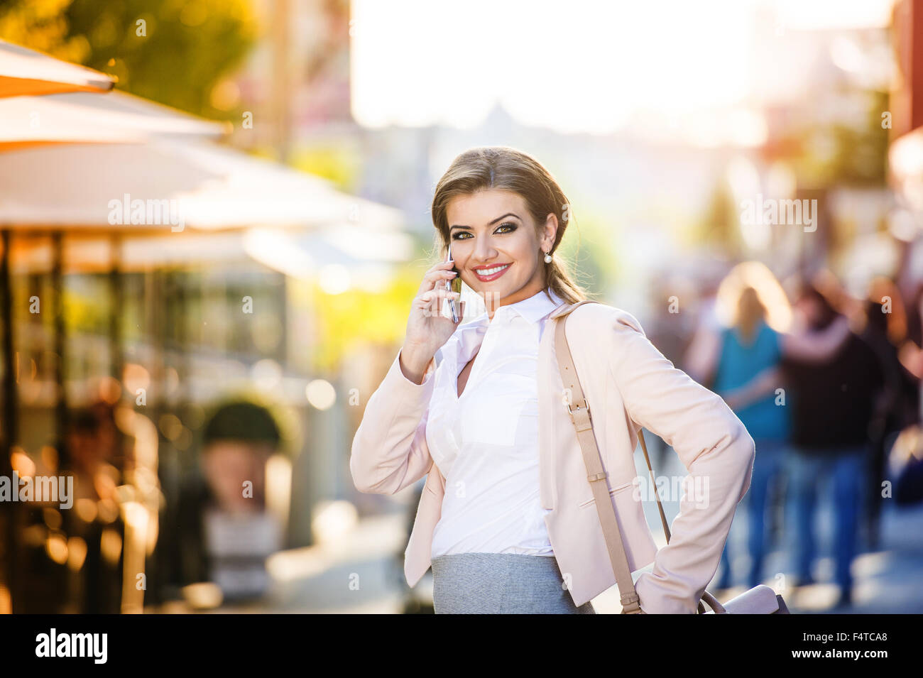 Beautiful young business woman Stock Photo - Alamy