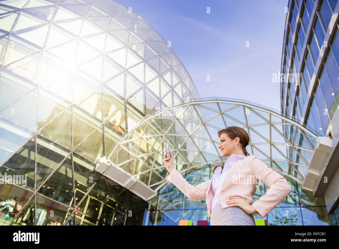 Beautiful young business woman Stock Photo - Alamy
