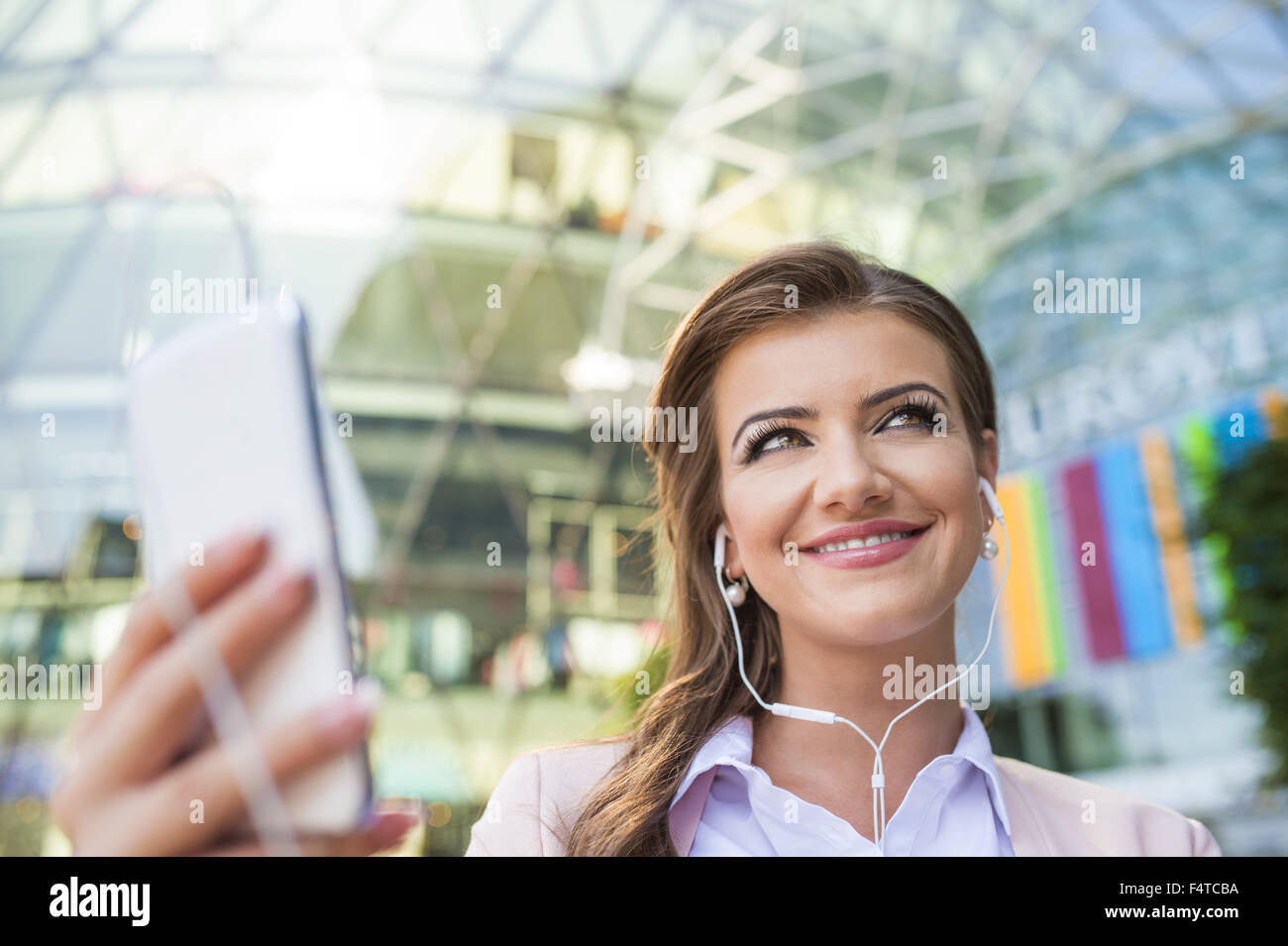 Beautiful young business woman Stock Photo - Alamy