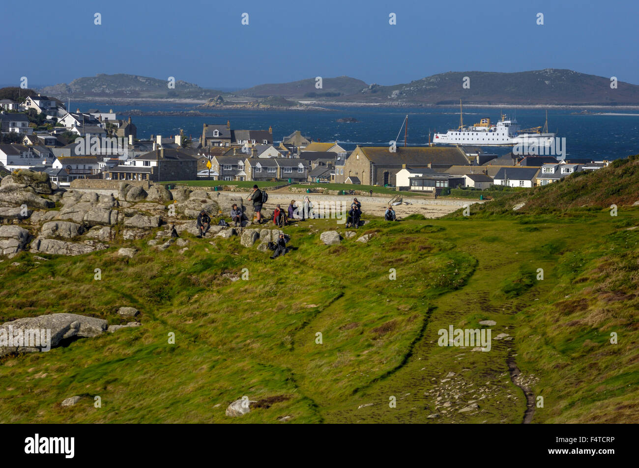 A group of ramblers resting by Hugh Town, St Mary's. Isles of Scilly. Cornwall. England. UK Stock Photo