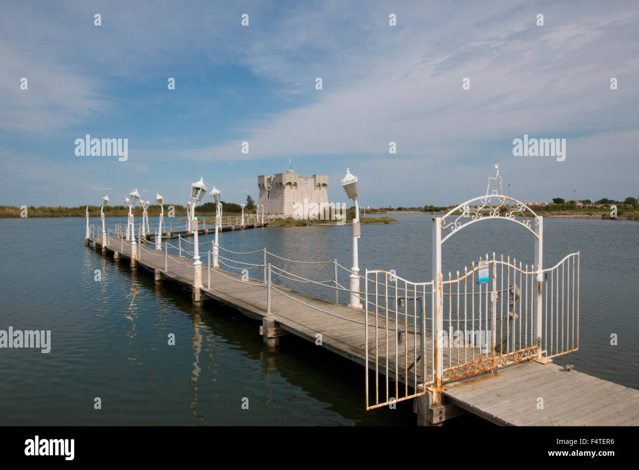 France, Europe, Palavas-les-Flots, Etang du Levant, water, tower, Redoute de Ballestras, tower, watch-tower, footbridge Stock Photo