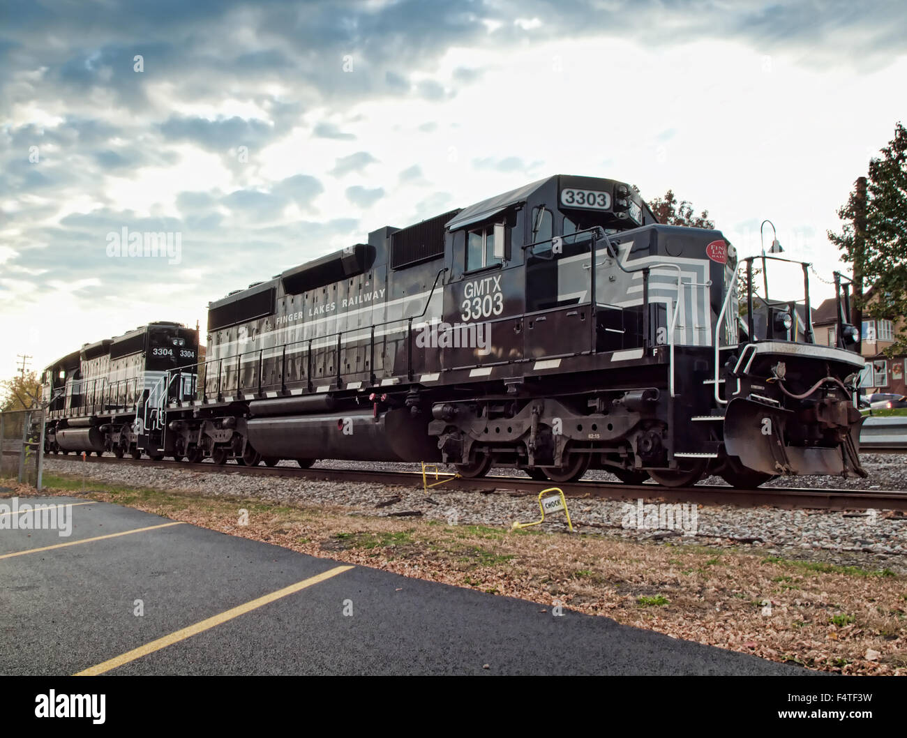 Solvay, New York, USA. October, 22,2015. The Fingerlakes Railway locomotive parked on the railway tracks in front of Chinatown F Stock Photo