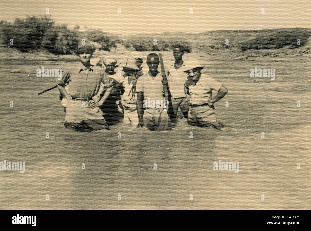 Group hunting in a river Stock Photo Alamy