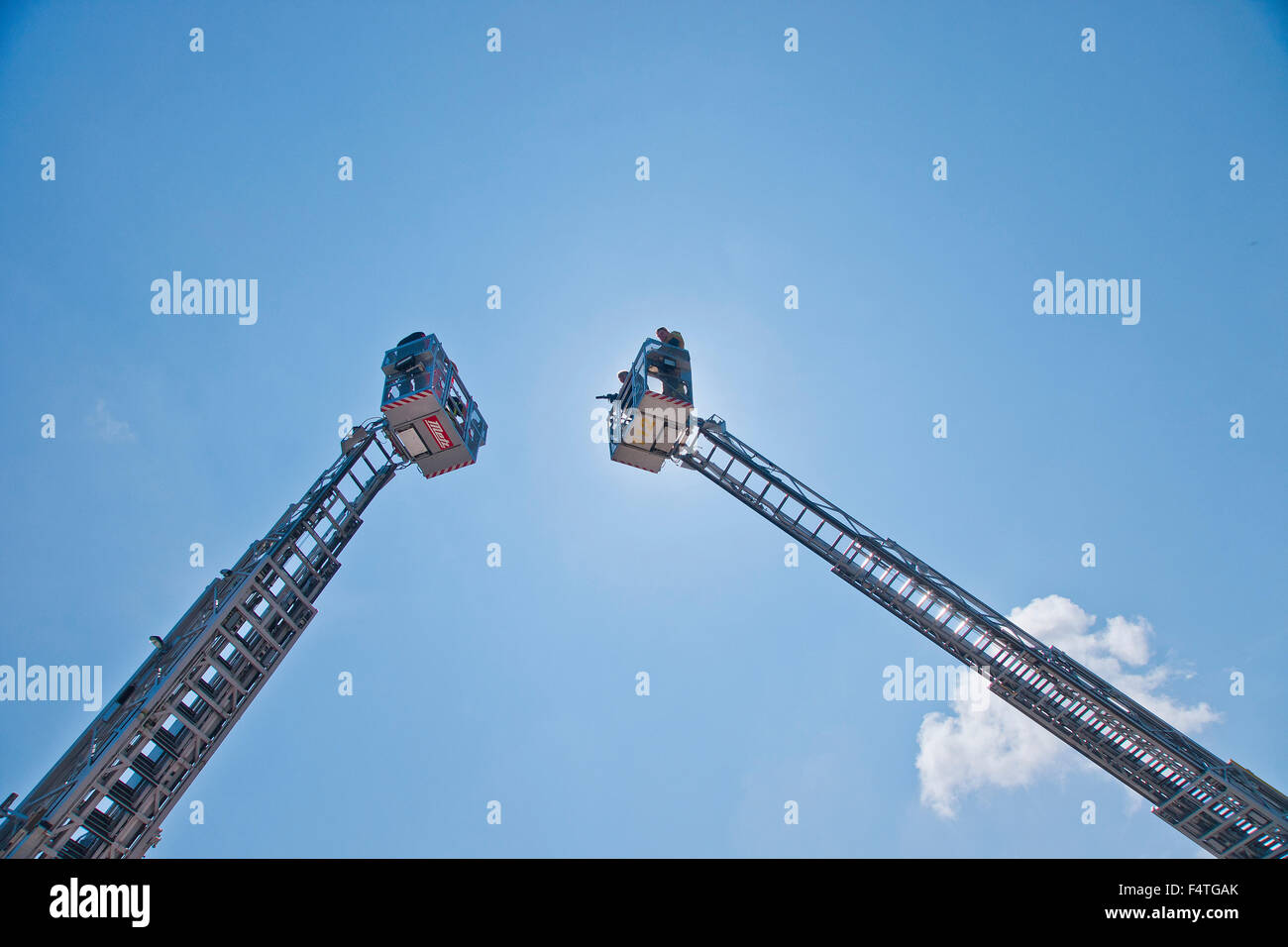 Germany, Bavaria, Germany, Teisendorf, fire brigade, ladder, aerial ladder, practise, exercise, back light, sky, sun Stock Photo