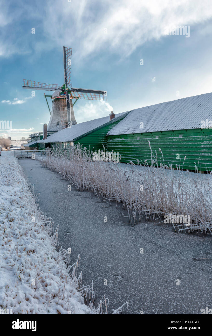 Brug across the river Zaan and windmill called De Bleeke Dood Stock Photo