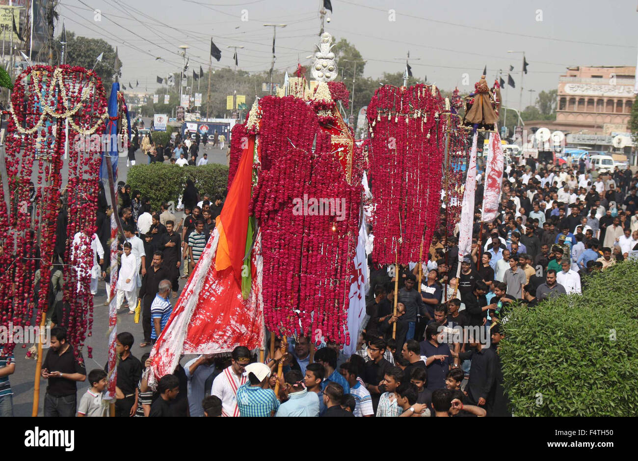 Devotees of Hazrat Imam Hussain (A.S) are participating in mourning procession in connection of 8th Moharram-ul-Haram, passing through M.A Jinnah Road in Karachi on Thursday, October 22, 2015. Stock Photo