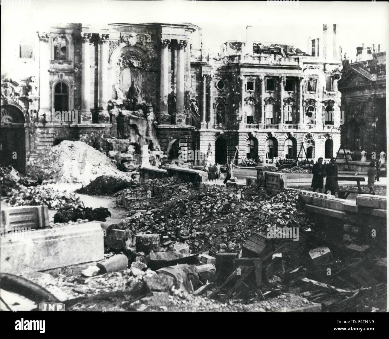1963 - Hungary In Throws Of Economic Anarchy: Compared with Germany, Hungary suffered comparitively little from allied bombs, but the collapse of the Pengo, which is to Hungary what the dollar is to America, has caused a type of destruction that, in the long view, may prove far more punishing than the bombs that shattered Germany. The Pengo was worth 17.49 cents before the war. Today you night put down as valueless. If you wanted to deal in Pengoes you could get 6,000,000 of them for a dollar. Mecca of dealers in Budapest today is the black market, and the Merchant Prince is the man who has a Stock Photo