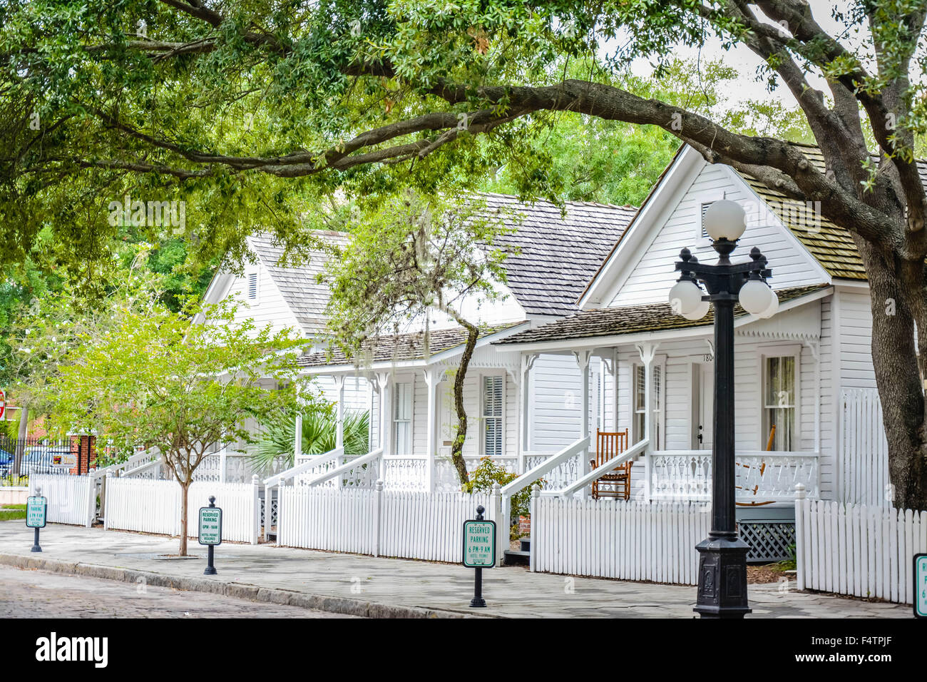 Renovated and restored wooden cottages in the Cuban immigrant neighborhoods near the cigar factories in Ybor City, FL Stock Photo