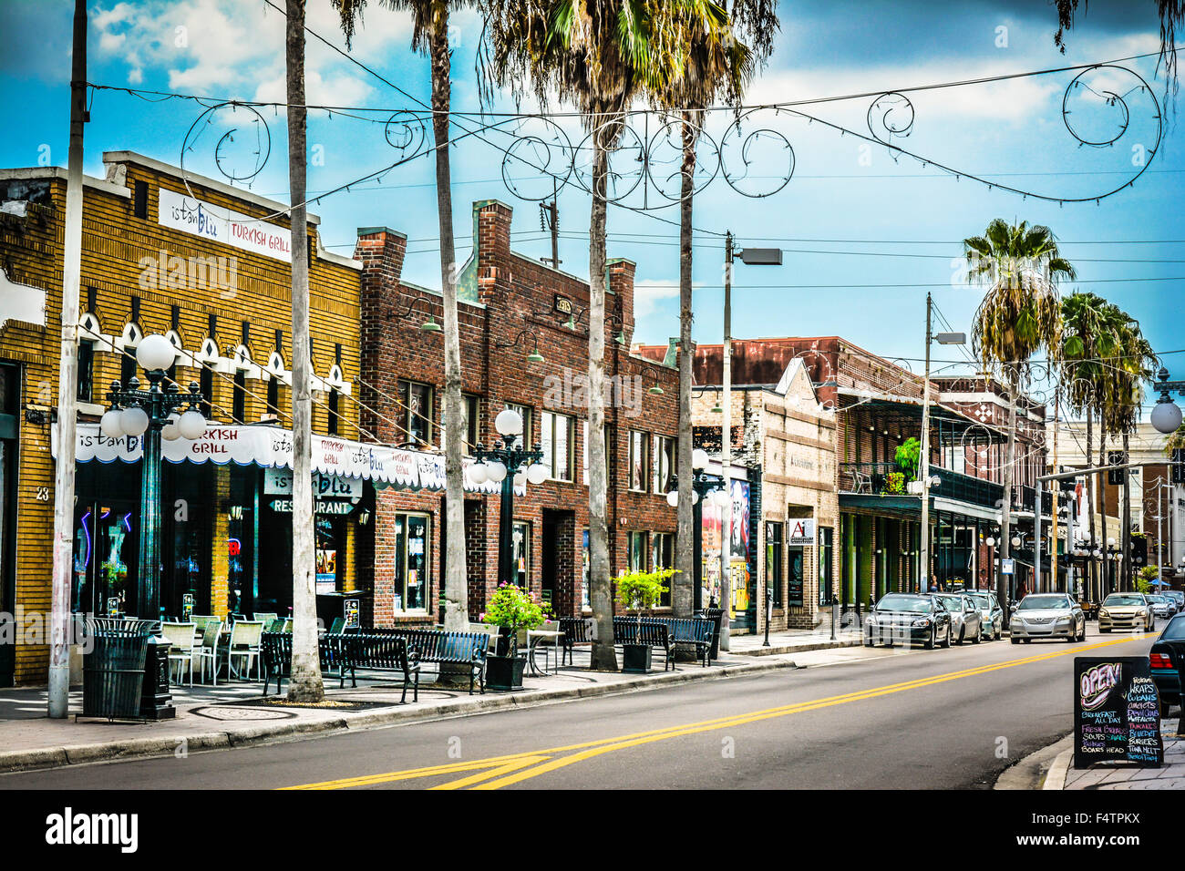 Historic old buildings housing small businesses & ethnic restaurants on