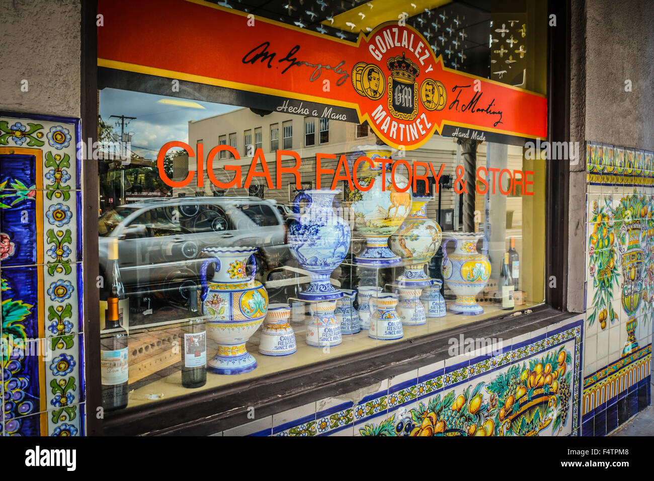 Beautifully colorful Spanish tile decorates a storefront for the Gonzales and Martinez Cigar