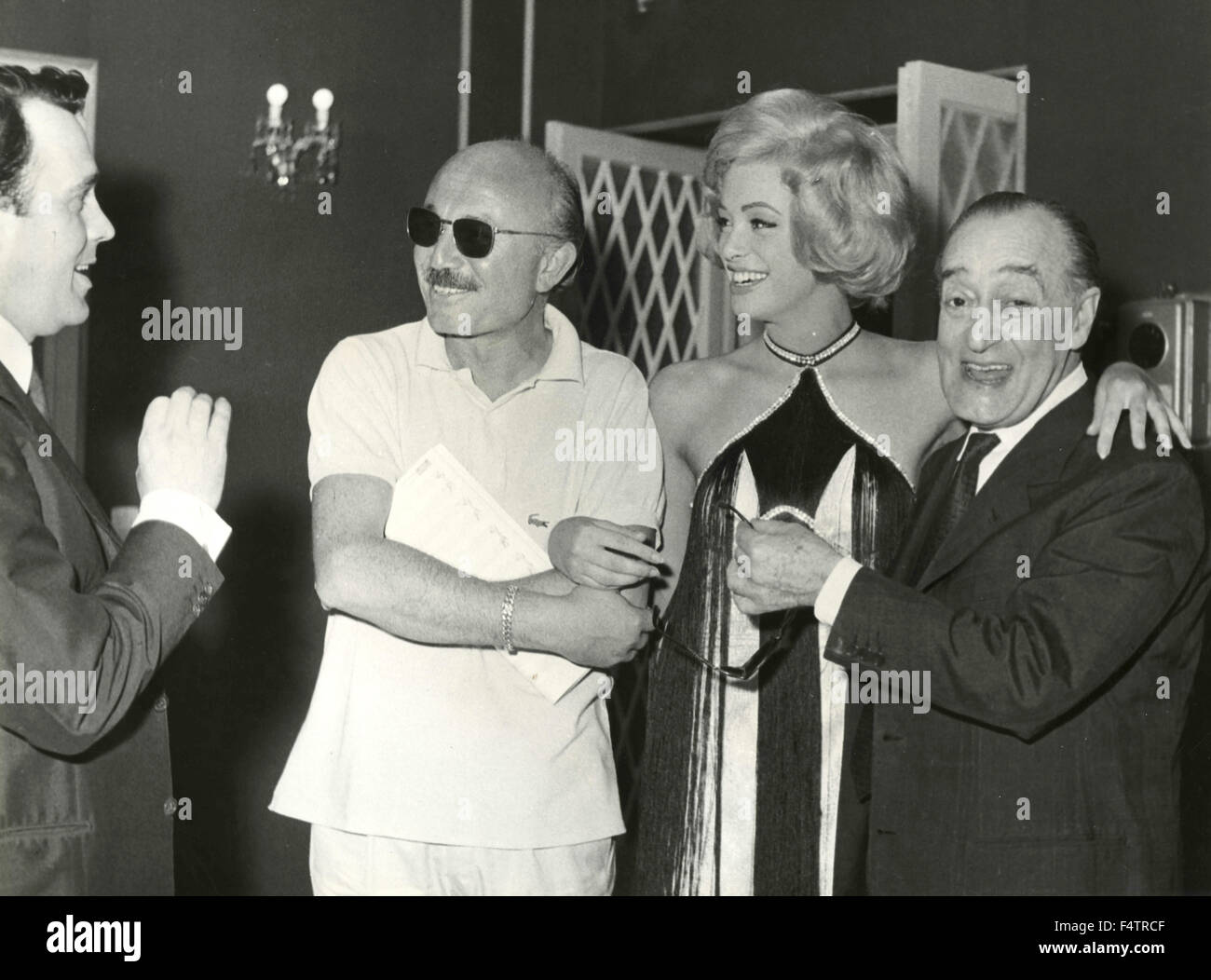 The actor Toto with actress Margaret Lee, the master and producer Armando Trovajoli Mario Mariani, Italy Stock Photo