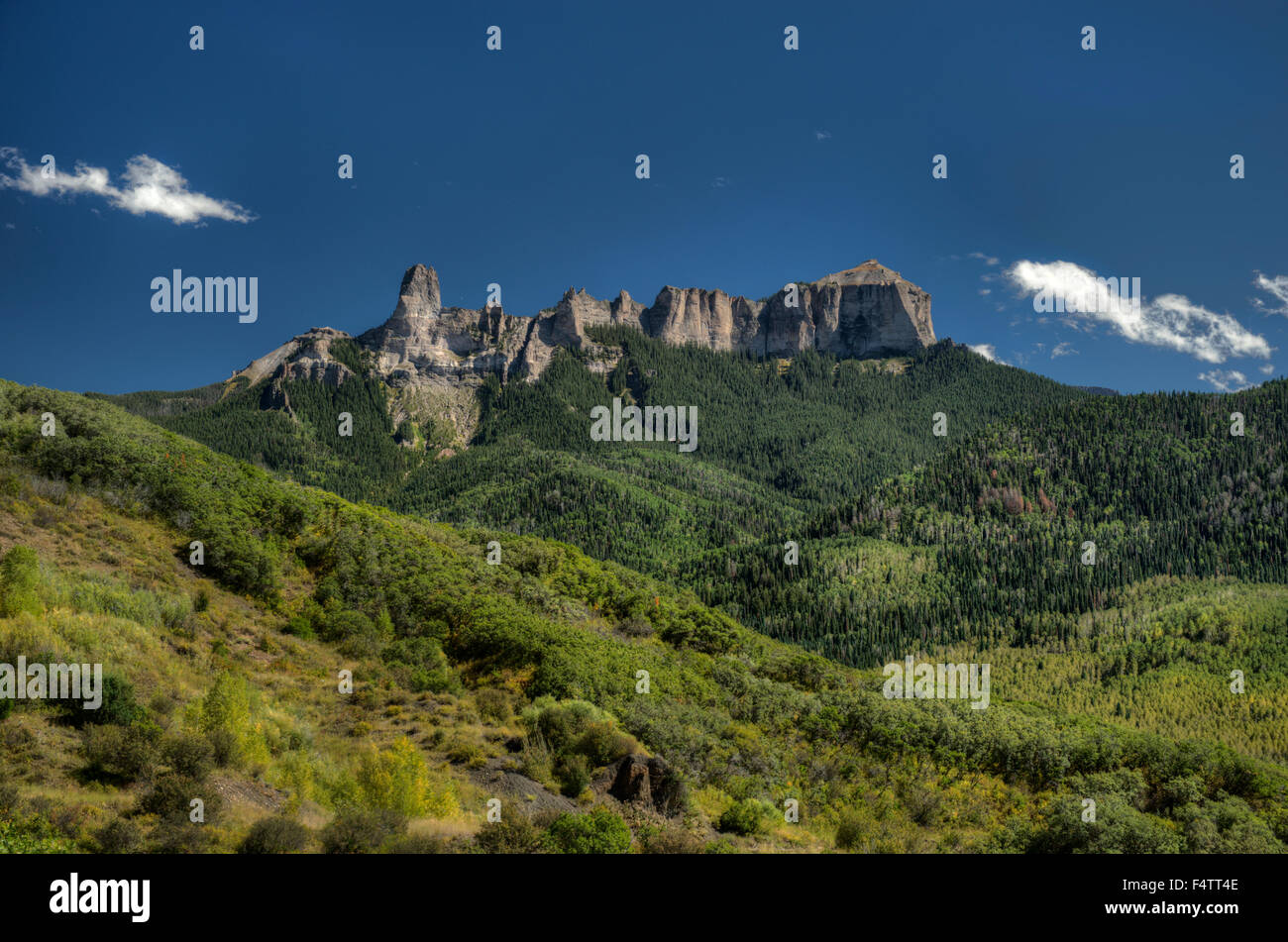 Courthouse Mountain (right) and Chimney Rock (left), on Cimarron Ridge east of Ridgeway, Colorado Stock Photo