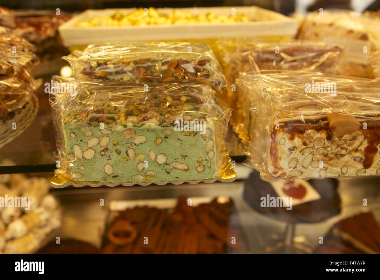 food sweets typical Italian sweets window shop cafe Italian bakery for sale detail almonds green