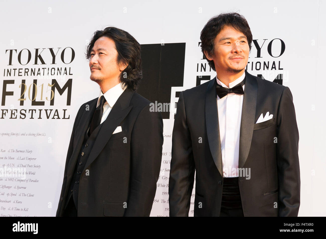 Tokyo, Japan. 22nd Oct, 2015. (L to R) Cast and crew of the movie LAST KNIGHTS director Kazuaki Kiriya and actor Tsuyoshi Ihara pose for the cameras during the Opening Red Carpet for the 28th Tokyo International Film Festival (TIFF) at Roppongi Hills Arena on October 22, 2015, in Tokyo, Japan. The Film Festival will run through until Saturday 31. Credit:  Rodrigo Reyes Marin/AFLO/Alamy Live News Stock Photo