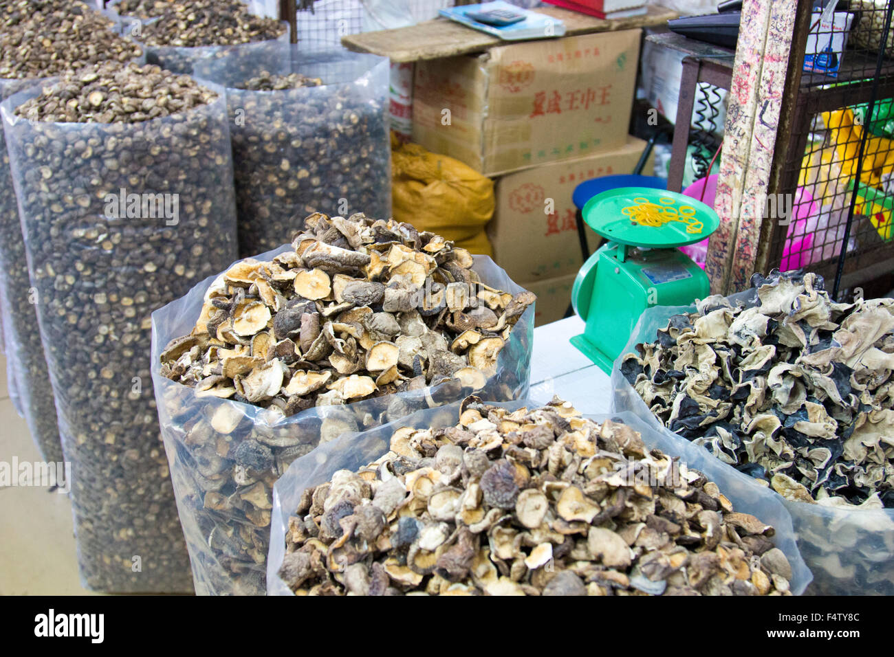dried mushrooms bagged and for sale in the street market in Hanoi old